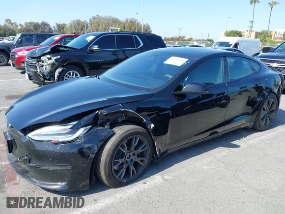 2022 Tesla Model S with VIN 5YJSA1E5XNF467435, listed as a IAAI auction lot 42538706 with 26,504 mi miles and . Bid and sale history available at DreamBid. Image 19.
