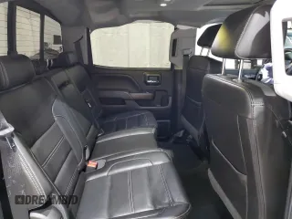2018 GMC Sierra 2500HD Denali z VIN 1GT12UEY3JF252702, wystawiony jako Copart lot #55387655 z przebiegiem 75 059 mil mil oraz Szkody całkowita. Historia ofert i sprzedaży dostępna na DreamBid. Obrazek 10.