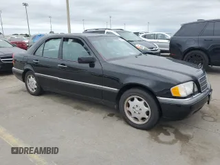 1997 Mercedes-Benz C z VIN WDBHA23EXVF560999, wystawiony jako Copart lot #74100944 z przebiegiem Nie podano mil oraz Nie do naprawy • Non repairable. Historia ofert i sprzedaży dostępna na DreamBid. Obrazek 4.