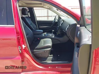 2013 Dodge Durango R/T with VIN 1C4SDJCTXDC697240, listed as a IAAI auction lot 42209558 with 130,735 mi miles and . Bid and sale history available at DreamBid. Image 5.