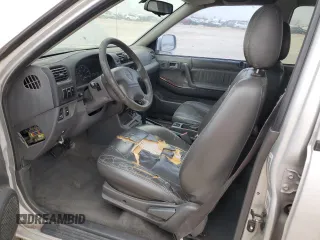 2000 Isuzu Rodeo S with VIN 4S2CK58W8Y4351180, listed as a Copart auction lot 44648595 with 375,829 mi miles and Salvage title. Bid and sale history available at DreamBid. Image 7.