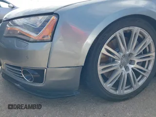 2011 Audi A8 with VIN WAUAVAFD5BN021080, listed as a IAAI auction lot 41223418 with 80,538 mi miles and . Bid and sale history available at DreamBid. Image 6.