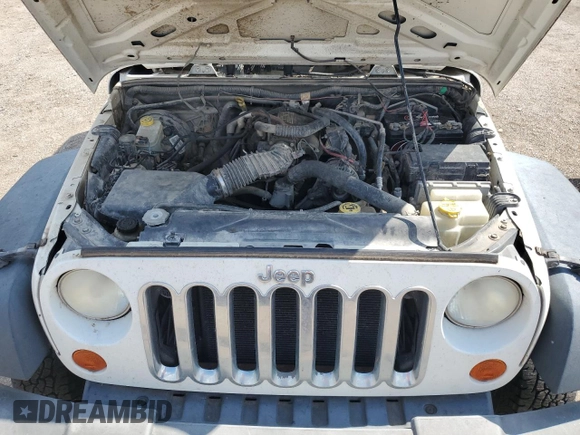 2008 Jeep Wrangler X с VIN 1J4FZ24188L503312, выставлен на аукционе Copart как лот 62013324 с пробегом 174 344 миль миль и Списание • Salvage title. История ставок и продаж доступна на DreamBid. Изображение 12.
