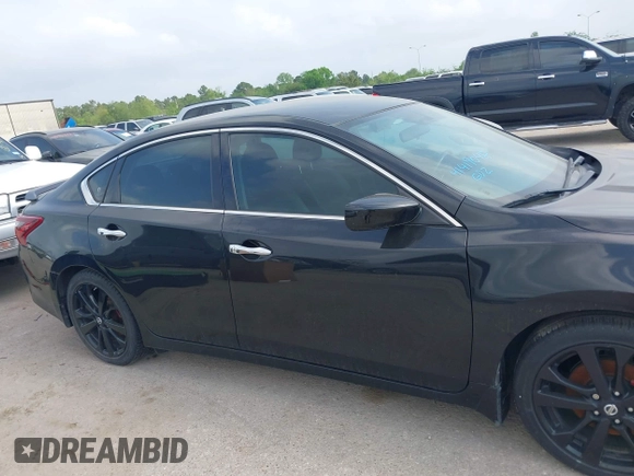 2017 Nissan Altima SR with VIN 1N4AL3AP0HC217024, listed as a IAAI auction lot 41729879 with 127,385 mi miles and . Bid and sale history available at carsss.com. Image 13.