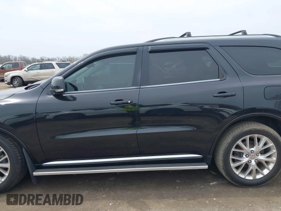 2016 Dodge Durango Limited with VIN 1C4RDHDG9GC480372, listed as a IAAI auction lot 42022764 with 100,091 mi miles and . Bid and sale history available at DreamBid. Image 14.