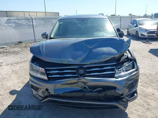 2018 Volkswagen Tiguan SEL z VIN 3VV3B7AXXJM205725, wystawiony jako IAAI lot #42285557 z przebiegiem 83 644 mil mil oraz . Historia ofert i sprzedaży dostępna na DreamBid. Obrazek 12.