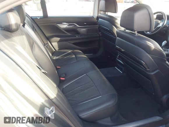 2018 BMW 7 Series 740i with VIN WBA7E2C55JB214987, listed as a IAAI auction lot 41733790 with 96,738 mi miles. Bid and sale history available at carsss.com. Image 8.