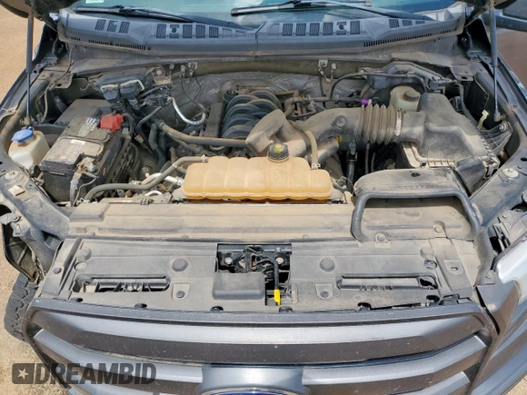 2015 Ford F-150 XLT with VIN 1FTFX1EF5FFA36961, listed as a Copart auction lot 62402475 with 139,431 mi miles and Salvage title. Bid and sale history available at DreamBid. Image 11.
