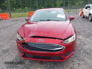 2017 Ford Fusion Hybrid SE with VIN 3FA6P0LU1HR238283, listed as a IAAI auction lot 42233496 with 123,452 mi miles and . Bid and sale history available at DreamBid. Image 12.