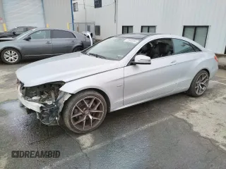2012 Mercedes-Benz E 350 with VIN WDDKJ5KB3CF173701, listed as a Copart auction lot 81848304 with 208,390 mi miles and Salvage Title. Bid and sale history available at DreamBid. Image 1.