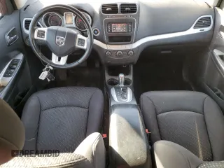 2013 Dodge Journey American Value with VIN 3C4PDCAB4DT590975, listed as a Copart auction lot 55627725 with 212,659 mi miles and Clean Title. Bid and sale history available at DreamBid. Image 8.