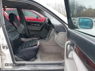 1996 Audi A6 z VIN WAUGA84A6TN084231, wystawiony jako IAAI lot #40940280 z przebiegiem 210 502 mil mil oraz . Historia ofert i sprzedaży dostępna na DreamBid. Obrazek 5.