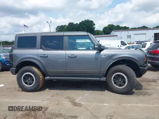 2024 Ford Bronco Outer Banks z VIN 1FMDE8BHXRLA40761, wystawiony jako IAAI lot #42704734 z przebiegiem 22 706 mil mil oraz . Historia ofert i sprzedaży dostępna na DreamBid. Obrazek 13.