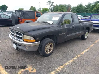 2000 Dodge Dakota with VIN 1B7GL22X2YS763505, listed as a IAAI auction lot 42608242 with 131,159 mi miles and . Bid and sale history available at DreamBid. Image 2.