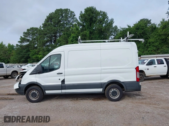 2015 Ford Transit Cargo with VIN 1FTNR1CM2FKB29029, listed as a IAAI auction lot 42286089 with 130,845 mi miles and . Bid and sale history available at DreamBid. Image 14.