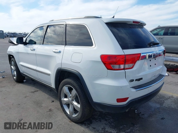 2013 Jeep Grand Cherokee Overland with VIN 1C4RJECT6DC533434, listed as a IAAI auction lot 41656116 with 122,809 mi miles. Bid and sale history available at carsss.com. Image 3.