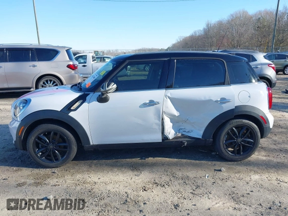 2012 MINI Countryman with VIN WMWZB3C50CWM30524, listed as a IAAI auction lot 41623400 with 194,858 mi miles and . Bid and sale history available at DreamBid. Image 14.