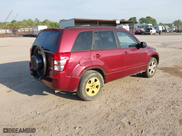 2006 Suzuki Grand Vitara Luxury with VIN JS3TD947564104838, listed as a IAAI auction lot 42082783 with 122,912 mi miles. Bid and sale history available at carsss.com. Image 4.