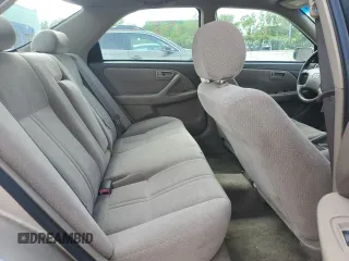 2001 Toyota Camry CE z VIN 4T1BG22K61U765881, wystawiony jako Copart lot #56186975 z przebiegiem 159 817 mil mil oraz Czysty tytuł • Clean title. Historia ofert i sprzedaży dostępna na DreamBid. Obrazek 10.