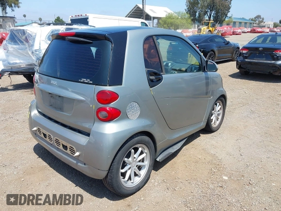 2008 Smart fortwo Pure with VIN WMEEJ31X08K139496, listed as a IAAI auction lot 42467749 with 108,787 mi miles and . Bid and sale history available at DreamBid. Image 4.