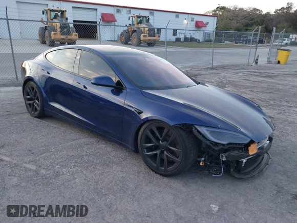 2023 Tesla Model S with VIN 5YJSA1E53PF518986, listed as a IAAI auction lot 41223046 with 22,204 mi miles and . Bid and sale history available at DreamBid. Image 1.