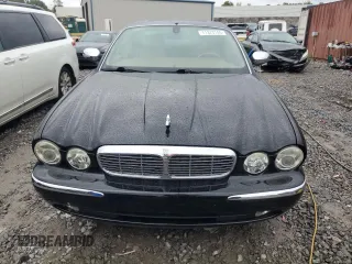2004 Jaguar XJ VDP with VIN SAJWA74C64SG27143, listed as a Copart auction lot 71373744 with 129,942 mi miles and Salvage Title. Bid and sale history available at carsss.com. Image 5.