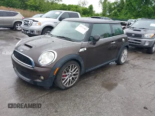 2010 MINI Hardtop S with VIN WMWMF7C50ATZ74395, listed as a IAAI auction lot 42227483 with 109,704 mi miles and . Bid and sale history available at DreamBid. Image 2.