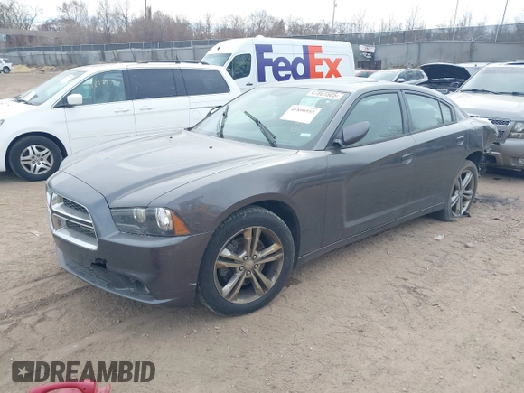 2014 Dodge Charger SXT Plus with VIN 2C3CDXJG0EH230635, listed as a IAAI auction lot 41890555 with 203,869 mi miles. Bid and sale history available at carsss.com. Image 2.