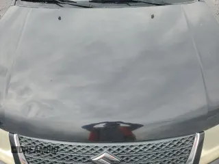 2009 Suzuki Grand Vitara z VIN JS3TE149794100133, wystawiony jako Copart lot #52919795 z przebiegiem 207 928 mil mil oraz Szkoda całkowita • Salvage title. Historia ofert i sprzedaży dostępna na DreamBid. Obrazek 12.
