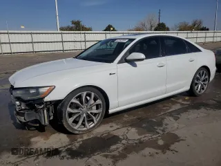 2014 Audi A6 Prestige with VIN WAUHGAFC9EN011849, listed as a Copart auction lot 52332355 with 181,142 mi miles and Salvage title. Bid and sale history available at DreamBid. Image 1.