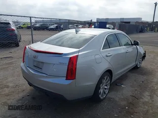 2018 Cadillac ATS RWD z VIN 1G6AA5RX5J0178702, wystawiony jako IAAI lot #41522724 z przebiegiem 79 502 mil mil oraz . Historia ofert i sprzedaży dostępna na DreamBid. Obrazek 4.