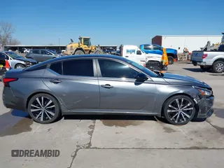 2020 Nissan Altima SR z VIN 1N4BL4CV9LC278578, wystawiony jako IAAI lot #41761814 z przebiegiem 76 453 mil mil oraz . Historia ofert i sprzedaży dostępna na DreamBid. Obrazek 13.