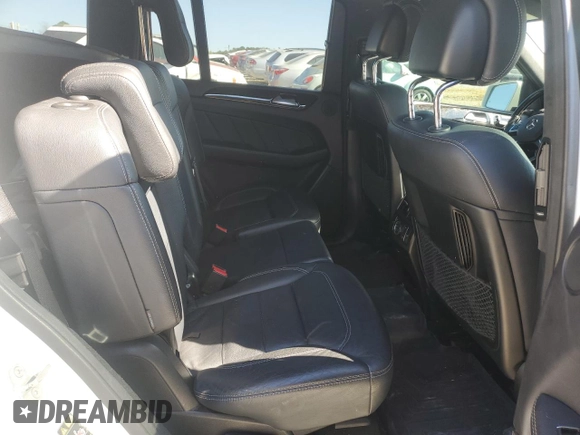 2016 Mercedes-Benz GL with VIN 4JGDF6EEXGA696311, listed as a Copart auction lot 77358304 with 113,398 mi miles and Salvage Title. Bid and sale history available at carsss.com. Image 12.