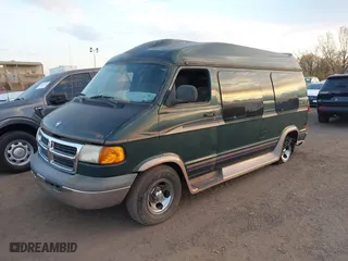 1999 Dodge Ram Van Conversion with VIN 2B6HB11Y8XK546999, listed as a IAAI auction lot 40672821 with NaN miles. Bid and sale history available at carsss.com. Image 18.