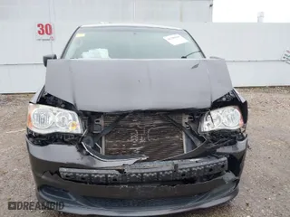 2016 Dodge Grand Caravan SE with VIN 2C4RDGBG3GR182422, listed as a IAAI auction lot 41295041 with 106,069 mi miles. Bid and sale history available at carsss.com. Image 13.