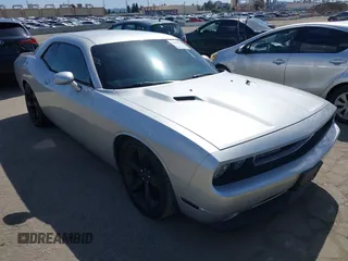 2012 Dodge Challenger R/T z VIN 2C3CDYBT6CH144809, wystawiony jako IAAI lot #41958418 z przebiegiem 107 038 mil mil oraz . Historia ofert i sprzedaży dostępna na DreamBid. Obrazek 1.