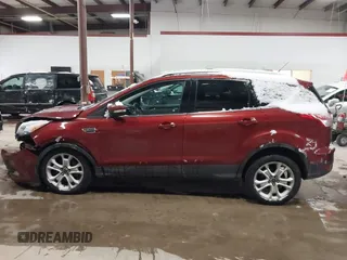 2016 Ford Escape Titanium with VIN 1FMCU9JX6GUB57497, listed as a IAAI auction lot 41375019 with 1 mi miles. Bid and sale history available at carsss.com. Image 14.