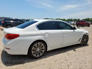 2018 BMW 5 Series 530i with VIN WBAJA5C55JG899661, listed as a Copart auction lot 58302215 with 62,112 mi miles and Salvage title. Bid and sale history available at DreamBid. Image 3.