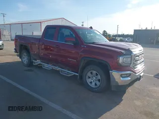 2018 GMC Sierra 1500 SLE z VIN 1GTV2MEC1JZ169984, wystawiony jako IAAI lot #41915236 z przebiegiem 135 722 mil mil oraz . Historia ofert i sprzedaży dostępna na DreamBid. Obrazek 1.
