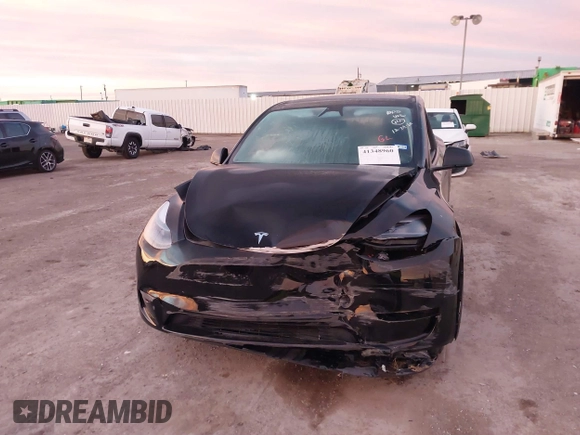 2023 Tesla Model Y Long Range z VIN 7SAYGDEE2PA166042, wystawiony jako IAAI lot #41348960 z przebiegiem Nie podano mil oraz . Historia ofert i sprzedaży dostępna na DreamBid. Obrazek 12.