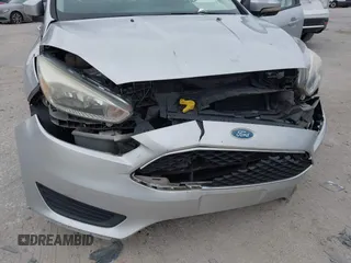 2015 Ford Focus SE with VIN 1FADP3K25FL328797, listed as a IAAI auction lot 41328404 with 72,368 mi miles. Bid and sale history available at carsss.com. Image 6.