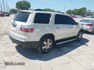 2010 GMC Acadia SLT2 z VIN 1GKLRNEDXAJ264998, wystawiony jako IAAI lot #42283547 z przebiegiem 178 810 mil mil oraz . Historia ofert i sprzedaży dostępna na DreamBid. Obrazek 4.