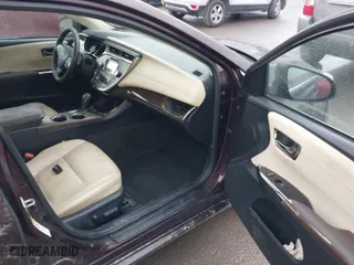 2014 Toyota Avalon Limited with VIN 4T1BK1EB4EU124593, listed as a IAAI auction lot 41064543 with 267,959 mi miles. Bid and sale history available at carsss.com. Image 5.