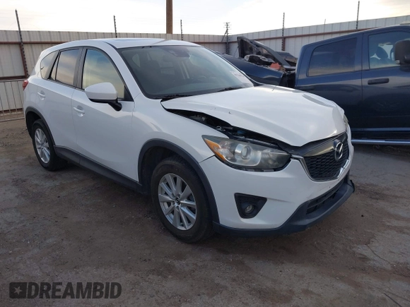 2014 Mazda CX-5 Touring with VIN JM3KE2CY8E0321578, listed as a IAAI auction lot 41769930 with 101,724 mi miles. Bid and sale history available at carsss.com. Image 1.
