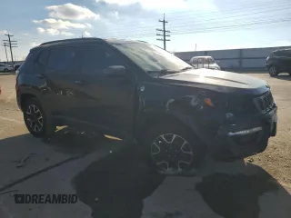 2020 Jeep Compass Trailhawk with VIN 3C4NJDDBXLT196297, listed as a Copart auction lot 87486584 with 108,766 mi miles and Salvage Title. Bid and sale history available at carsss.com. Image 4.