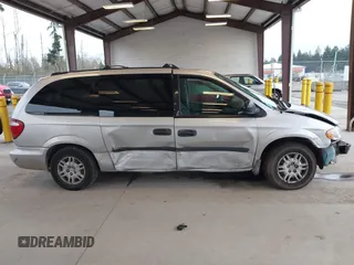 2005 Dodge Caravan SE with VIN 1D4GP24R85B351591, listed as a IAAI auction lot 41949337 with 130,821 mi miles and . Bid and sale history available at DreamBid. Image 14.