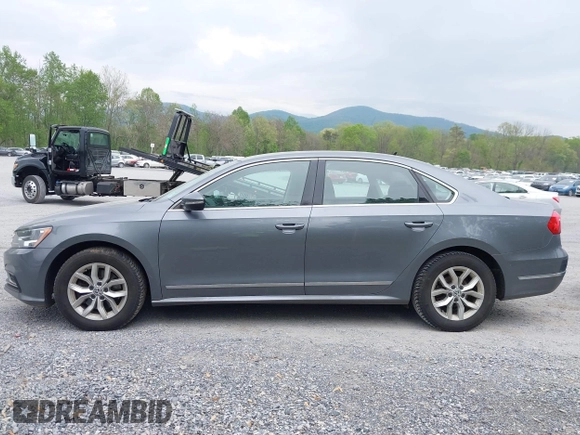 2016 Volkswagen Passat 1.8T S with VIN 1VWAT7A39GC032948, listed as a IAAI auction lot 42127599 with 177,407 mi miles. Bid and sale history available at carsss.com. Image 14.