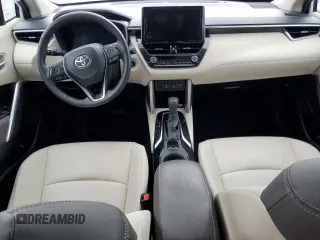 2023 Toyota Corolla Cross XLE с VIN 7MUDAAAG6PV071281, выставлен на аукционе Copart как лот 59691915 с пробегом Не указан миль и Списание • Salvage title. История ставок и продаж доступна на DreamBid. Изображение 8.