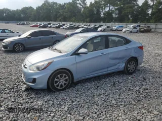 2012 Hyundai Accent GLS with VIN KMHCT4AE0CU163794, listed as a Copart auction lot 63550285 with 157,872 mi miles and Salvage title. Bid and sale history available at DreamBid. Image 1.
