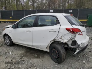2014 Mazda 2 Sport with VIN JM1DE1KY3E0181629, listed as a Copart auction lot 51043475 with 107,849 mi miles and Salvage Title. Bid and sale history available at carsss.com. Image 2.